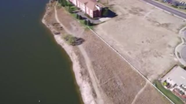 HIDDEN LAKE COLORADO-2016: A Seaside Area With Some House Near The Edge With A