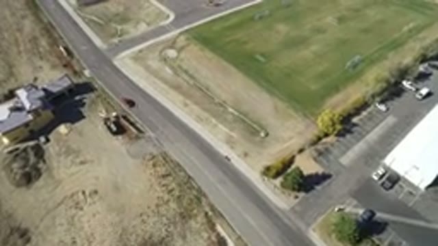 HIDDEN LAKE COLORADO-2016: Long Overhead Shot Showing Fields And A Parking Lot