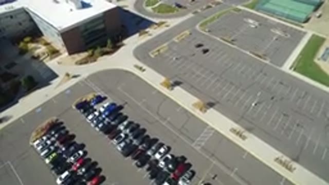HIDDEN LAKE COLORADO-2016: Overhead View Of Commercial Building Parking Lot With