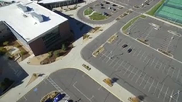 HIDDEN LAKE COLORADO-2016: Aerial View Of A Building Next To An Empty Parking Lot