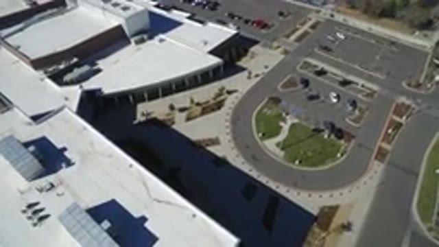 HIDDEN LAKE COLORADO-2016: Flyover Of A Large Building And Parking Lot During