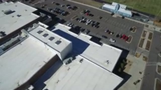 HIDDEN LAKE COLORADO-2016: Aerial Footage Of Cars Parked In A Parking Lot Next