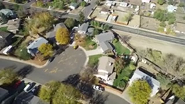 HIDDEN LAKE COLORADO-2016: An Aerial View Of A Neighborhood With A Lot Of Trees