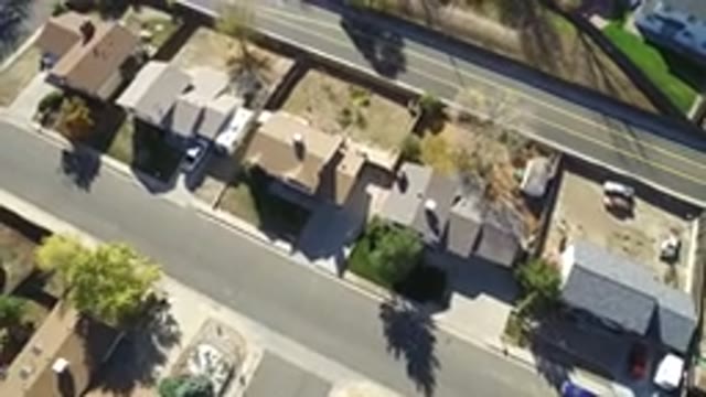 HIDDEN LAKE COLORADO-2016: Aerial View Of An Empty Street With Several Houses