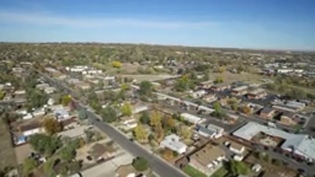 HIDDEN LAKE COLORADO-2016: Aerial City View With Houses And Mountains