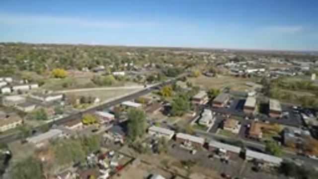 HIDDEN LAKE COLORADO-2016: Aerial Drone Flyover Footage Of Town And A Main Road