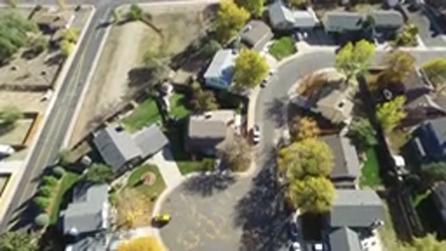 HIDDEN LAKE COLORADO-2016: Drone Helicopter Flying Over City Neighborhood Streets