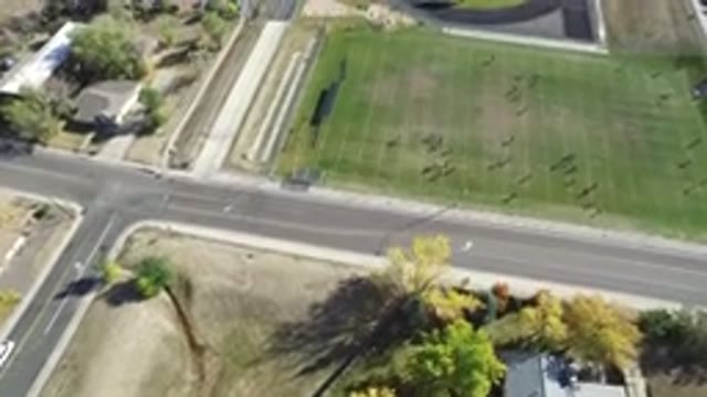 HIDDEN LAKE COLORADO-2016: A View Looking Down At People On A Football Field