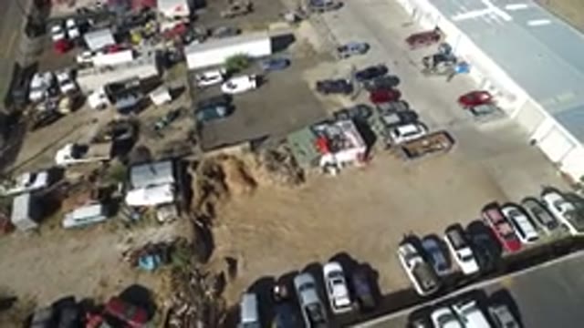 HIDDEN LAKE COLORADO-2016: Cars At A Warehouse Parking Lot In The Desert