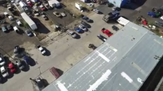 HIDDEN LAKE COLORADO-2016: Drone Video Of A Factory Parking Lot With Many Cars