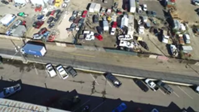 HIDDEN LAKE COLORADO-2016: White Truck With Blue Container Reversing On A Road