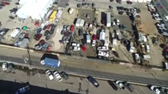 HIDDEN LAKE COLORADO-2016: Top View Of Many Cars Packed And A Blue Van
