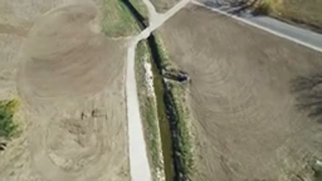 HIDDEN LAKE COLORADO-2016: Flying Over A Valley Covered In Dirt And Grass