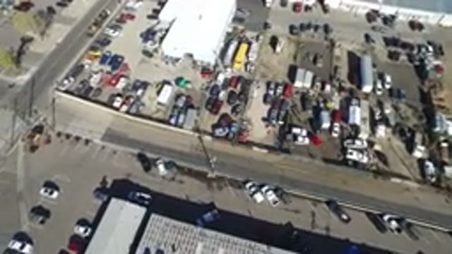 HIDDEN LAKE COLORADO-2016: Overhead View Of Factory Complex With Parked Cars