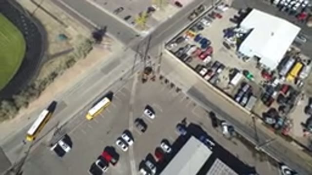 HIDDEN LAKE COLORADO-2016: Urban Area Full Of Vehicles Near A Sports Field