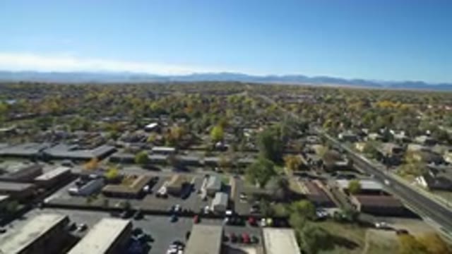 HIDDEN LAKE COLORADO-2016: An Overhead Shot Of A Busy City With A Highway Nearby