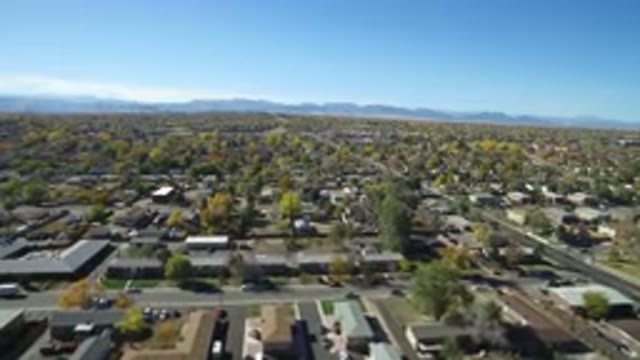 HIDDEN LAKE COLORADO-2016: Aerial View Panning Across The Suburbs Of A Regional