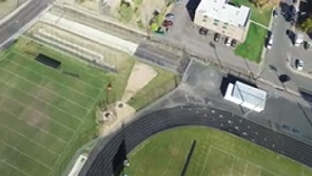 HIDDEN LAKE COLORADO-2016: A Top View Of Buildings And Cars Next To A Sports Facility