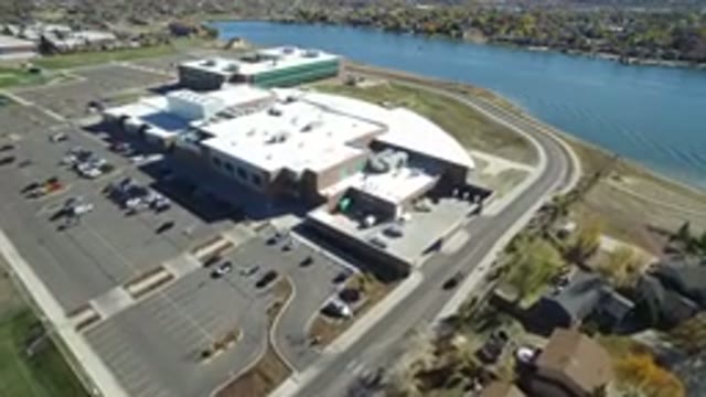 HIDDEN LAKE COLORADO-2016: Helicopter Filming A Big Mall Near A River