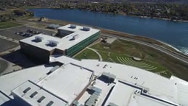 HIDDEN LAKE COLORADO-2016: Aerial Video With A Large Body Of Water Next To The Industrial Complex