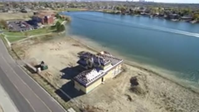 HIDDEN LAKE COLORADO-2016: An Aerial View Of A House Next To A Sea And There Is