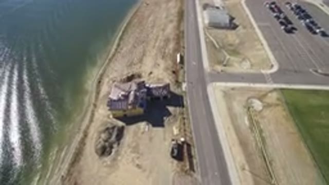 HIDDEN LAKE COLORADO-2016: Air View Of A Ruined House Close To The High Tide