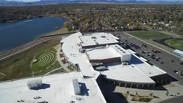 HIDDEN LAKE COLORADO-2016: Aerial View Of A Building Near A Lake And A Forest