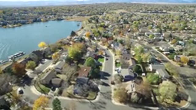 HIDDEN LAKE COLORADO-2016: Aerial Footage Of A Town On A Lake Showing Empty