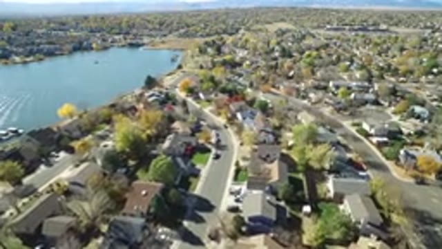 HIDDEN LAKE COLORADO-2016: Aerial View Of Houses Cars Trees And Water