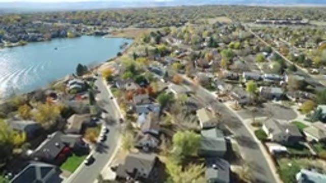 HIDDEN LAKE COLORADO-2016: Houses Roads And Trees With A Big Ocean In The Left