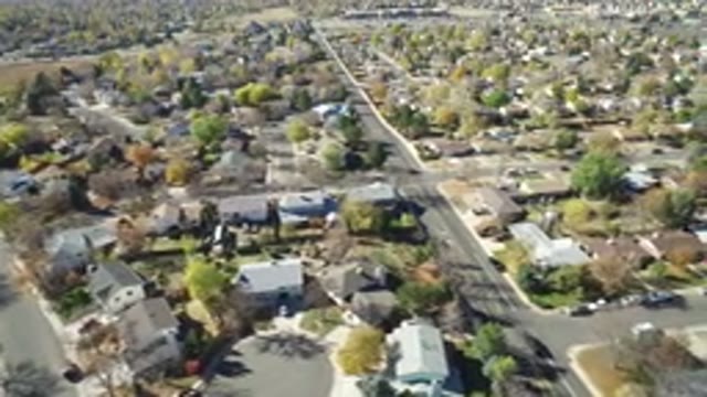 HIDDEN LAKE COLORADO-2016: An Aerial View Of A City Landscape With Houses And Trees