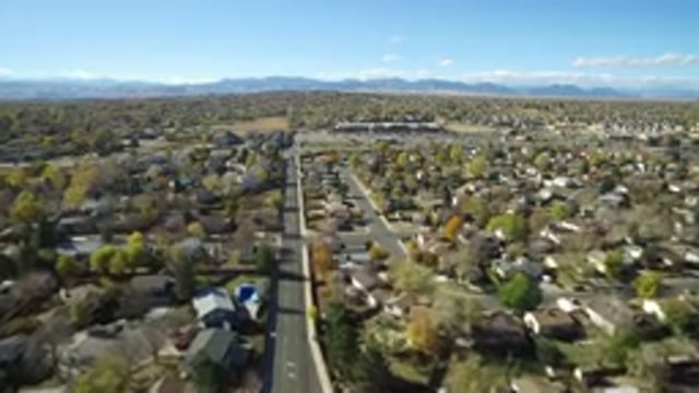 HIDDEN LAKE COLORADO-2016: Going Down The Street Of A Picturesque Suburban Town