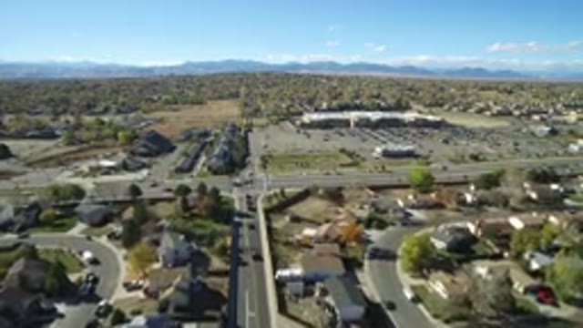 HIDDEN LAKE COLORADO-2016: Aerial View Of A City With Busy Streets Houses And