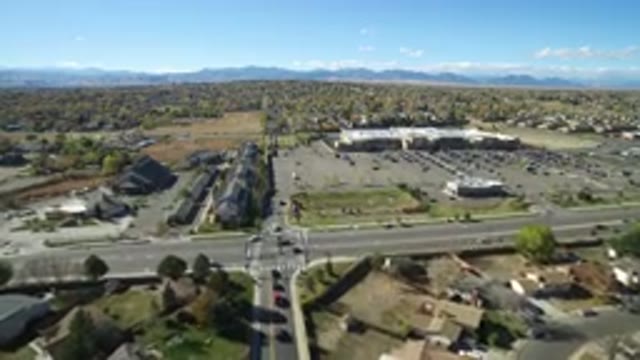 HIDDEN LAKE COLORADO-2016: Aerial View Of A City With Cars Passing Through The Streets