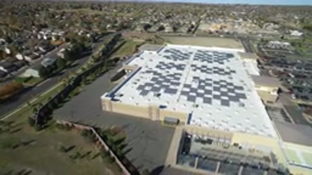 HIDDEN LAKE COLORADO-2016: View Of A Large Secure Building With Solar Panels
