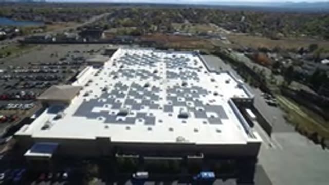 HIDDEN LAKE COLORADO-2016: Aerial View Of A Factory And Its Workers Cars