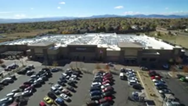 HIDDEN LAKE COLORADO-2016: Suburban Shopping Mall Entrance And Parking Lot In A
