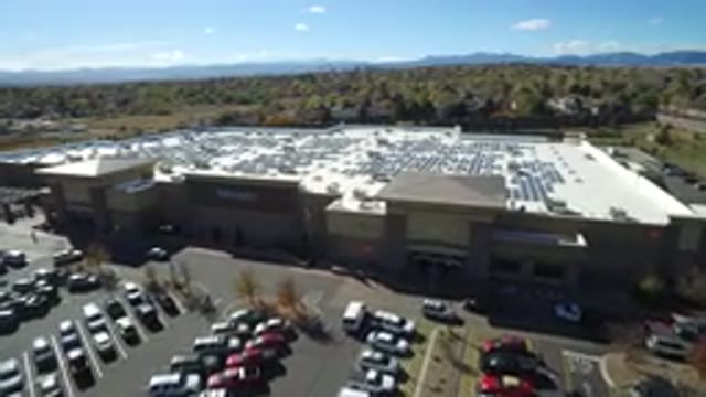HIDDEN LAKE COLORADO-2016: Sun Shining Bright Car Sparking One Area Cars Moving