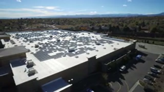 HIDDEN LAKE COLORADO-2016: Moving Aerial View By Drone Of Warehouse Midst