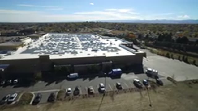 HIDDEN LAKE COLORADO-2016: Aerial View Of A Shed In A Parking Lot With Cars