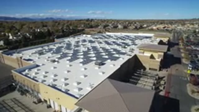 HIDDEN LAKE COLORADO-2016: Image Of The Roof Of A Large Mall Left Side Many