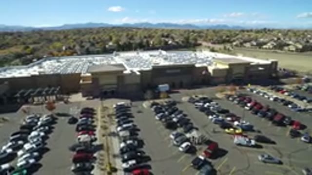 HIDDEN LAKE COLORADO-2016: Cars Standing In Front Of The Industry