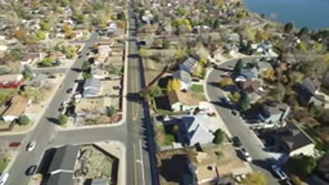 HIDDEN LAKE COLORADO-2016: Aerial View Of City With Predominant Houses On Beach