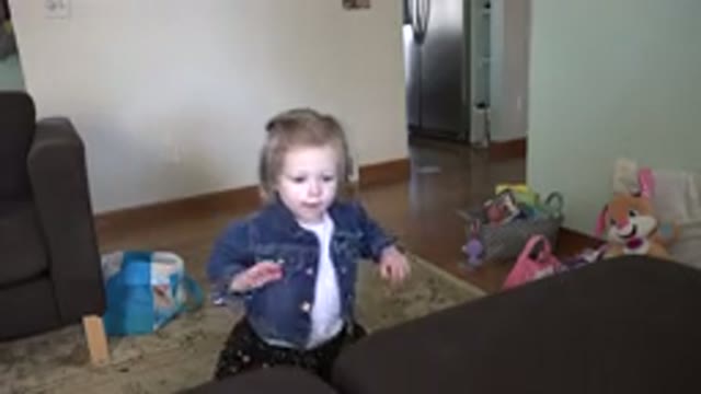 WESTMINSTER COLORADO-2016: Toddler Girl With Short Hair Walking In The Living Room