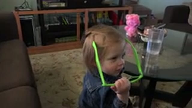 WESTMINSTER COLORADO-2016: Little Girl Shows Mom Her Cool Green Sunglasses And