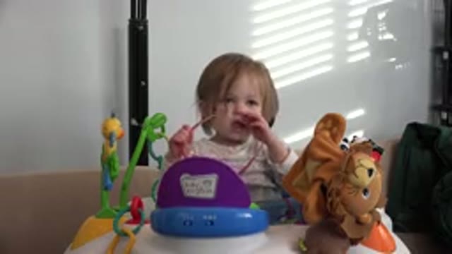 WESTMINSTER COLORADO-2016: Toddler Plays at Table with Toys While Eating