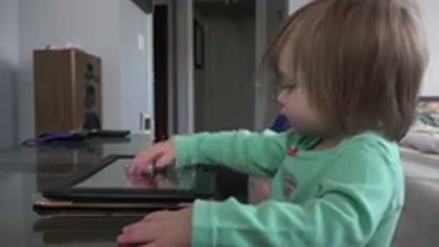 WESTMINSTER COLORADO-2016: Young Child Repeatedly Tapping Tablet With Fingertips