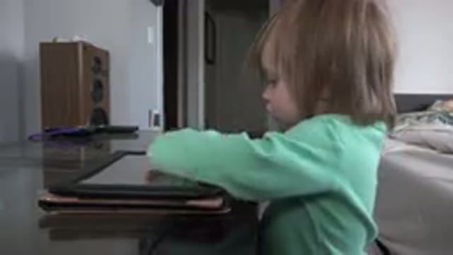 WESTMINSTER COLORADO-2016: Child Tries To Get This Tablet Thing To Do Something