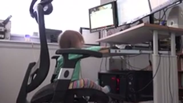 WESTMINSTER COLORADO-2016: Little Blond Girl In A Home Office Sitting In Front
