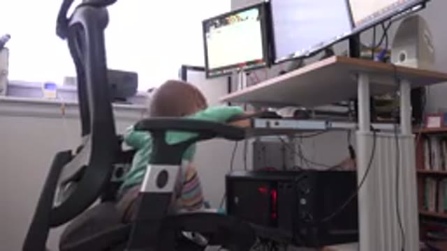 WESTMINSTER COLORADO-2016: A Person Sitting On A Computer Chair And They Are Typing